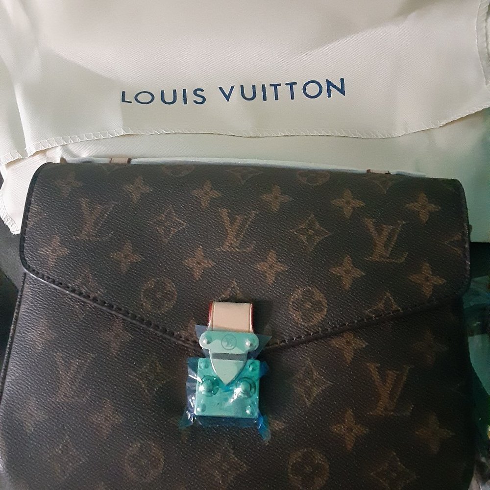 Cross body LV purse